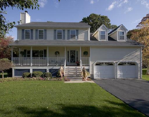 230 Pumpkin Ground Road Stratford, CT 06614 - Photo 1 of 1 a front view of a house with a garden and yard