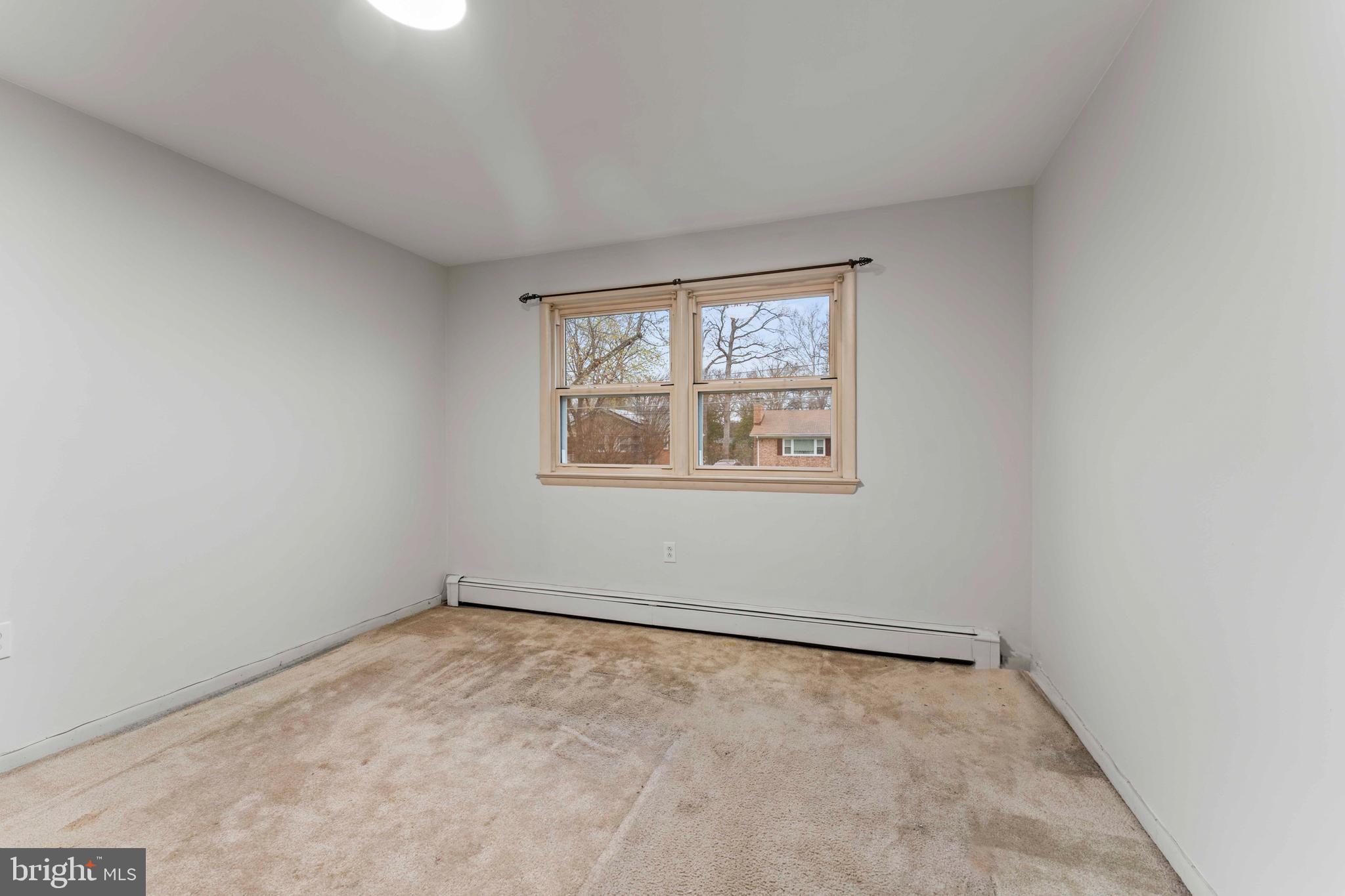 6805 Pamela Lane Clinton, MD 20735 - Photo 18 of 39 an empty room with a window