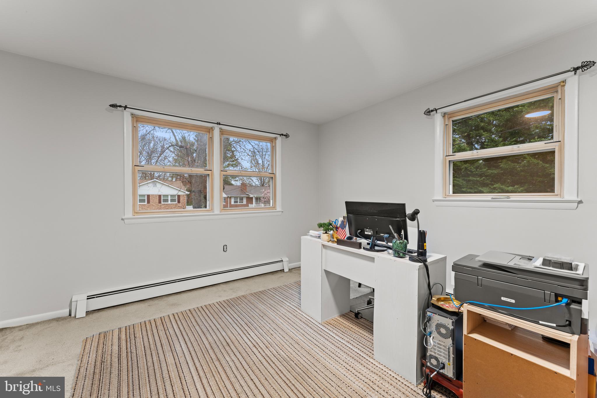 6805 Pamela Lane Clinton, MD 20735 - Photo 19 of 39 a kitchen with wooden floor and a stove top oven