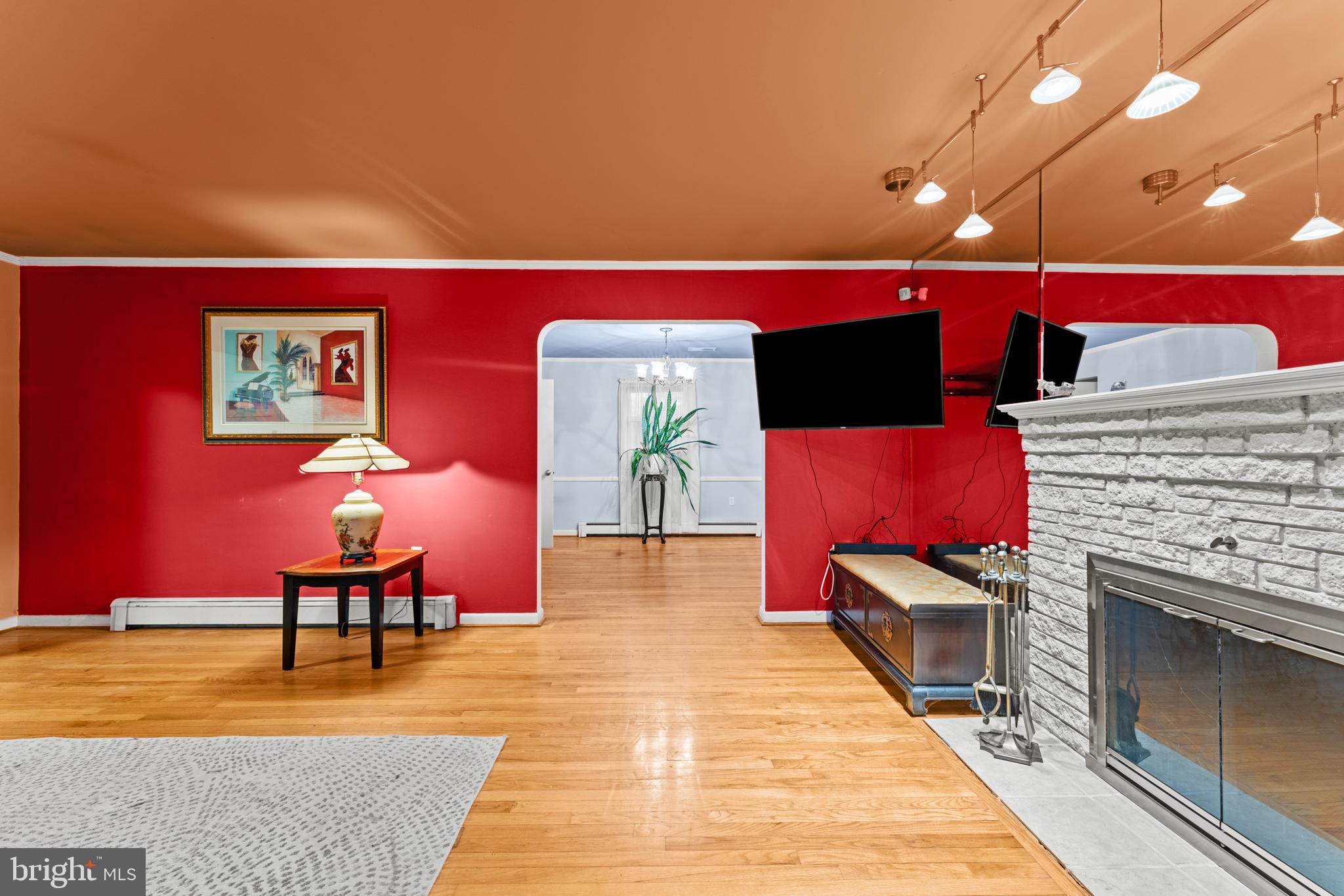 6805 Pamela Lane Clinton, MD 20735 - Photo 6 of 39 a lobby with furniture and rug