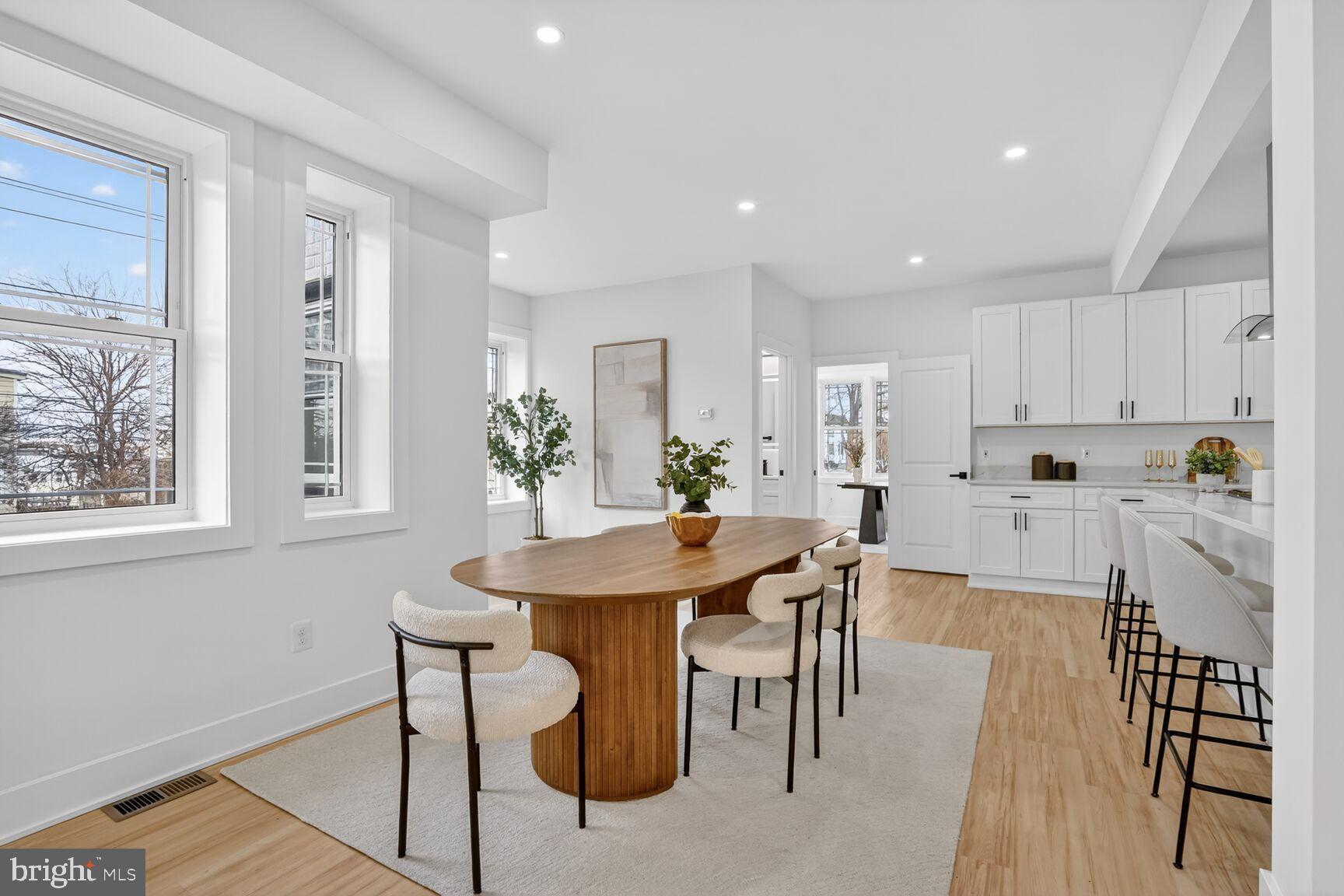 4629 9th Street Northwest Washington, DC 20011 - Photo 16 of 41 a view of a dining room with furniture and wooden floor
