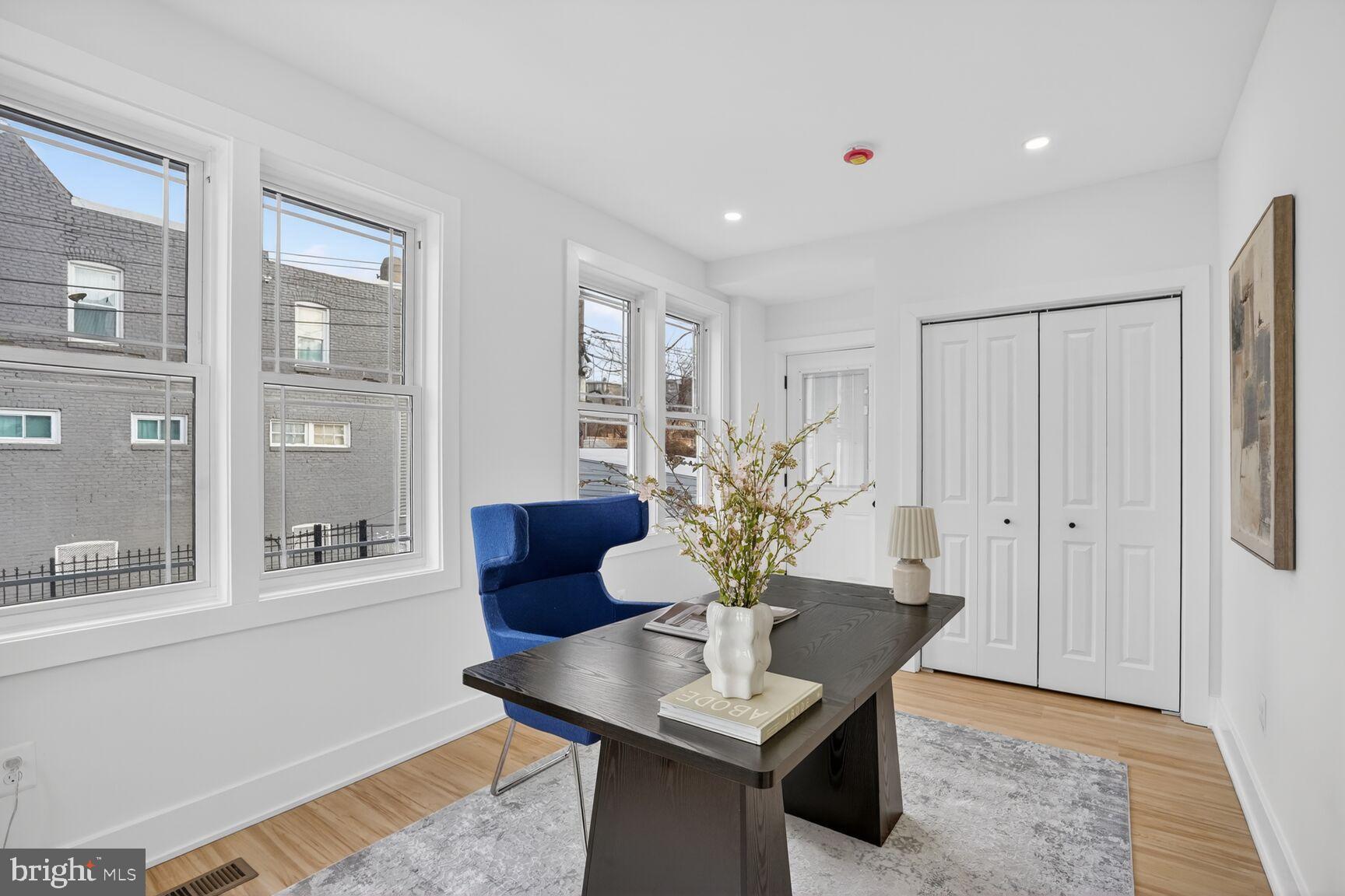 4629 9th Street Northwest Washington, DC 20011 - Photo 17 of 41 a dining room with furniture and wooden floor