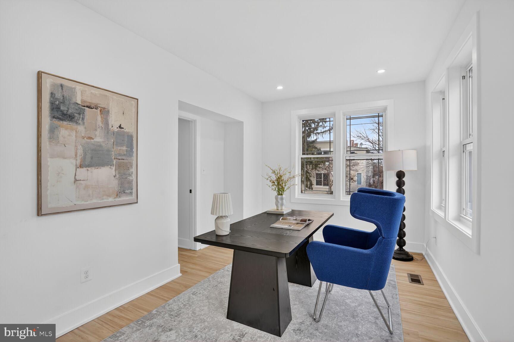 4629 9th Street Northwest Washington, DC 20011 - Photo 18 of 41 a view of a livingroom with furniture and wooden floor
