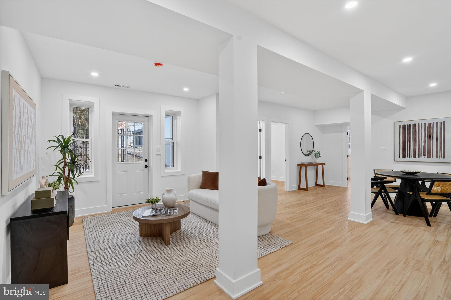 4629 9th Street Northwest Washington, DC 20011 - Photo 36 of 41 a living room with furniture and a table