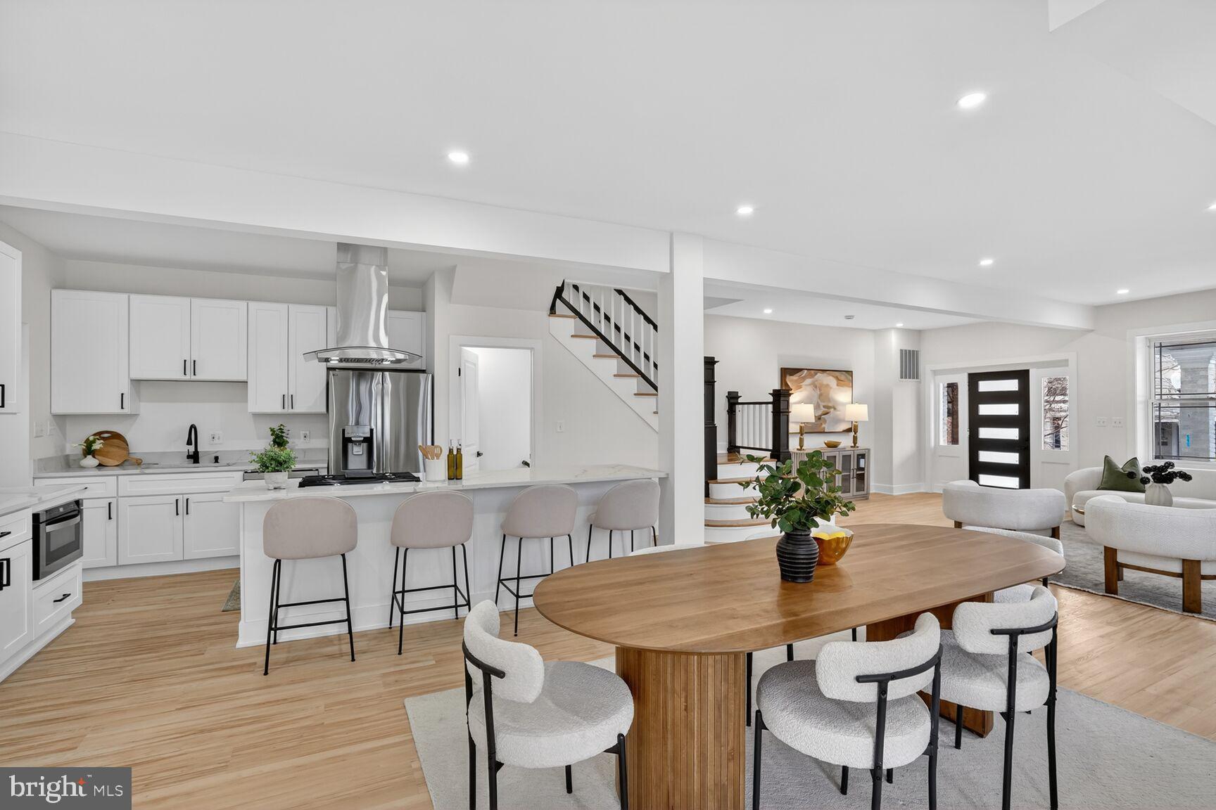4629 9th Street Northwest Washington, DC 20011 - Photo 9 of 41 a view of a dining room with furniture and wooden floor