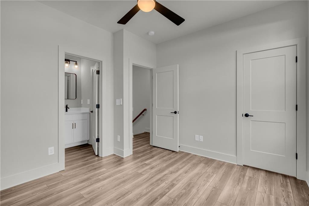 152 Chestnut Circle Atlanta, GA 30342 - Photo 26 of 53 wooden floor in an empty room
