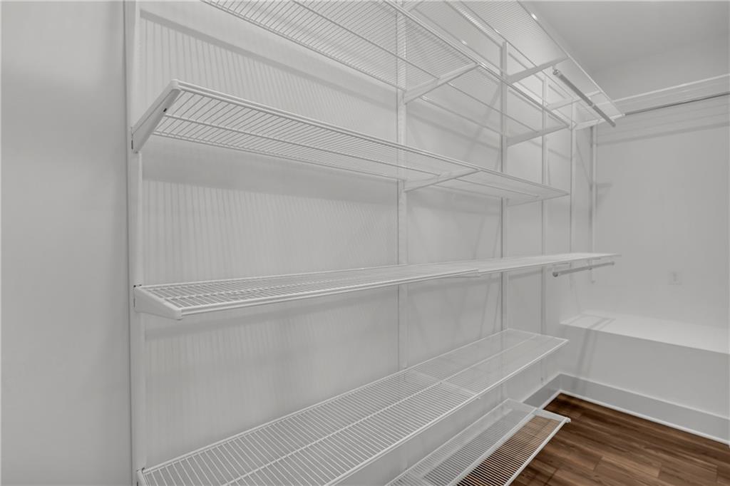 152 Chestnut Circle Atlanta, GA 30342 - Photo 33 of 53 a view of an empty walk in closet