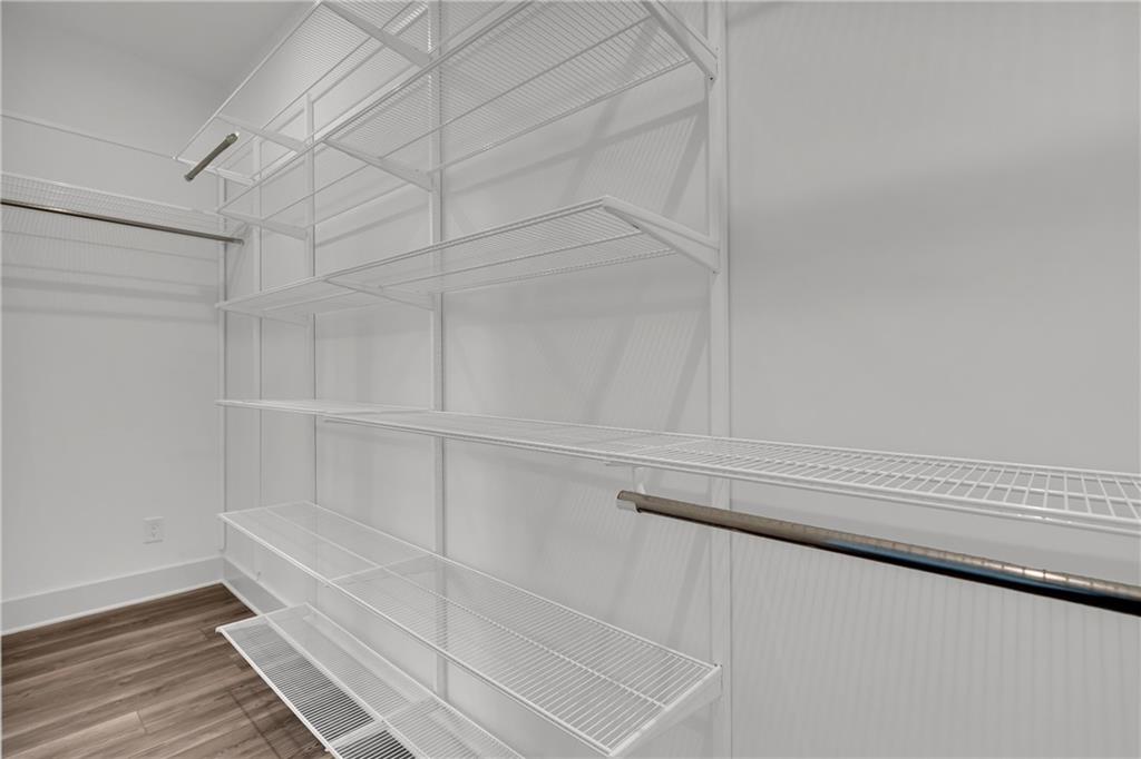 152 Chestnut Circle Atlanta, GA 30342 - Photo 34 of 53 a view of an empty walk in closet