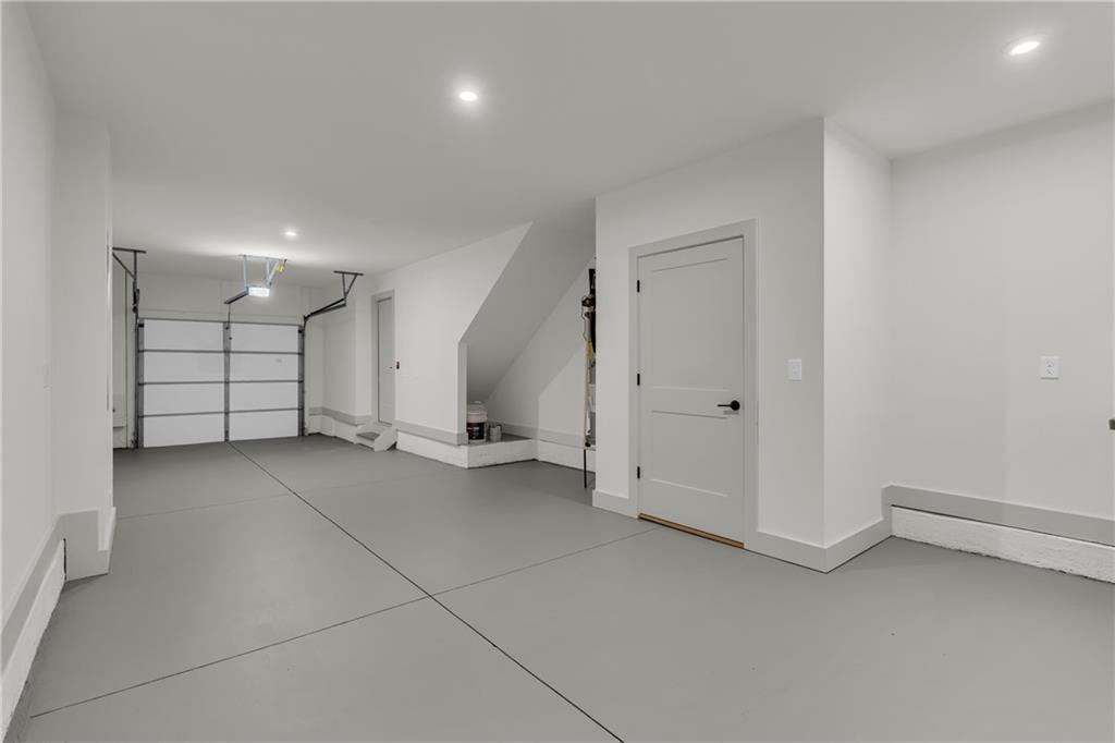 152 Chestnut Circle Atlanta, GA 30342 - Photo 40 of 53 an empty room with a bathroom and a shower