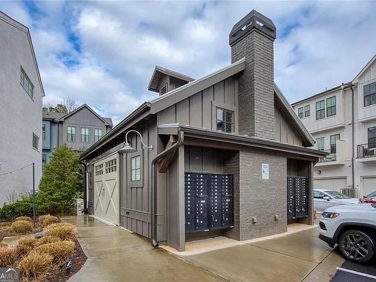 152 Chestnut Circle Atlanta, GA 30342 - Photo 41 of 53 a front view of a house with a garage