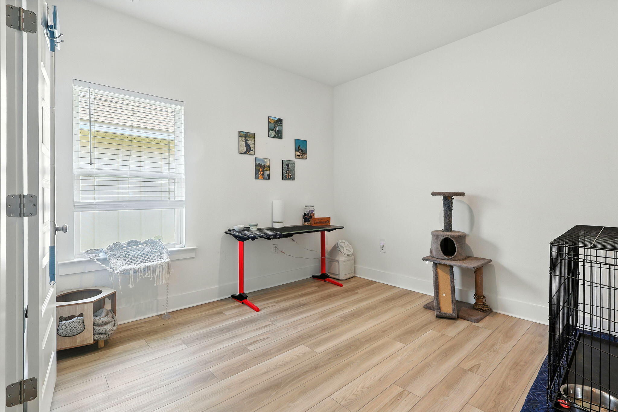 231 Lyla Lane Crestview, FL 32539 - Photo 21 of 30 a room with furniture and wooden floor