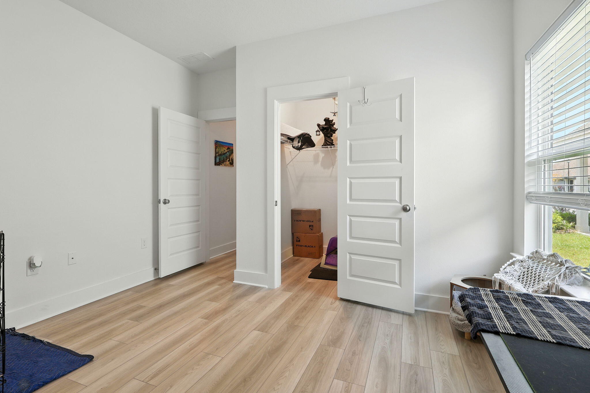 231 Lyla Lane Crestview, FL 32539 - Photo 22 of 30 wooden floor and closet in a room