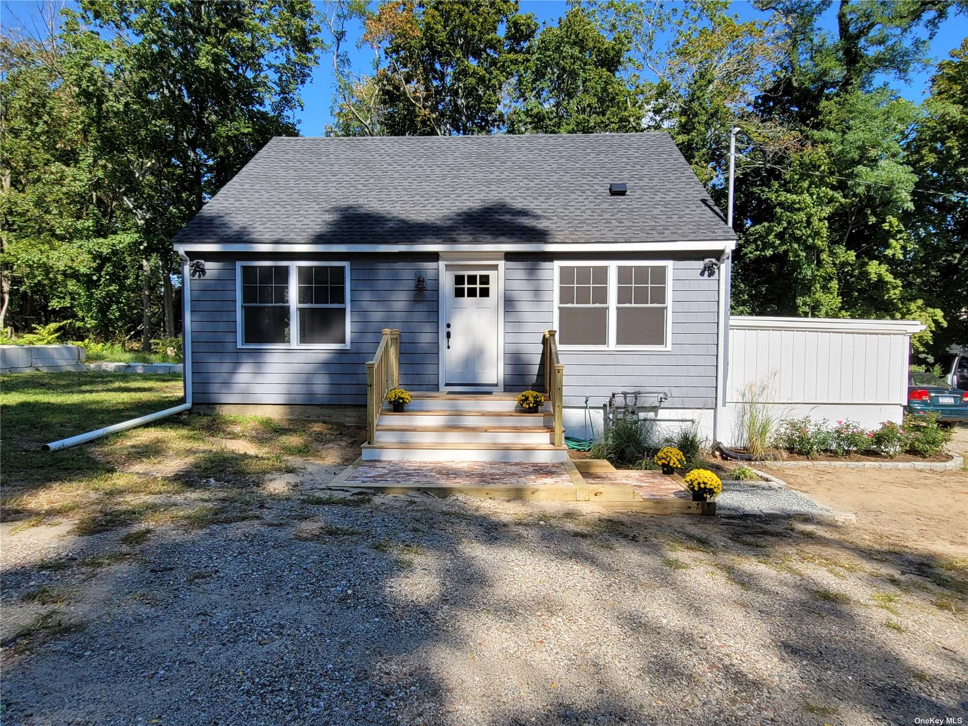 a view of house with yard