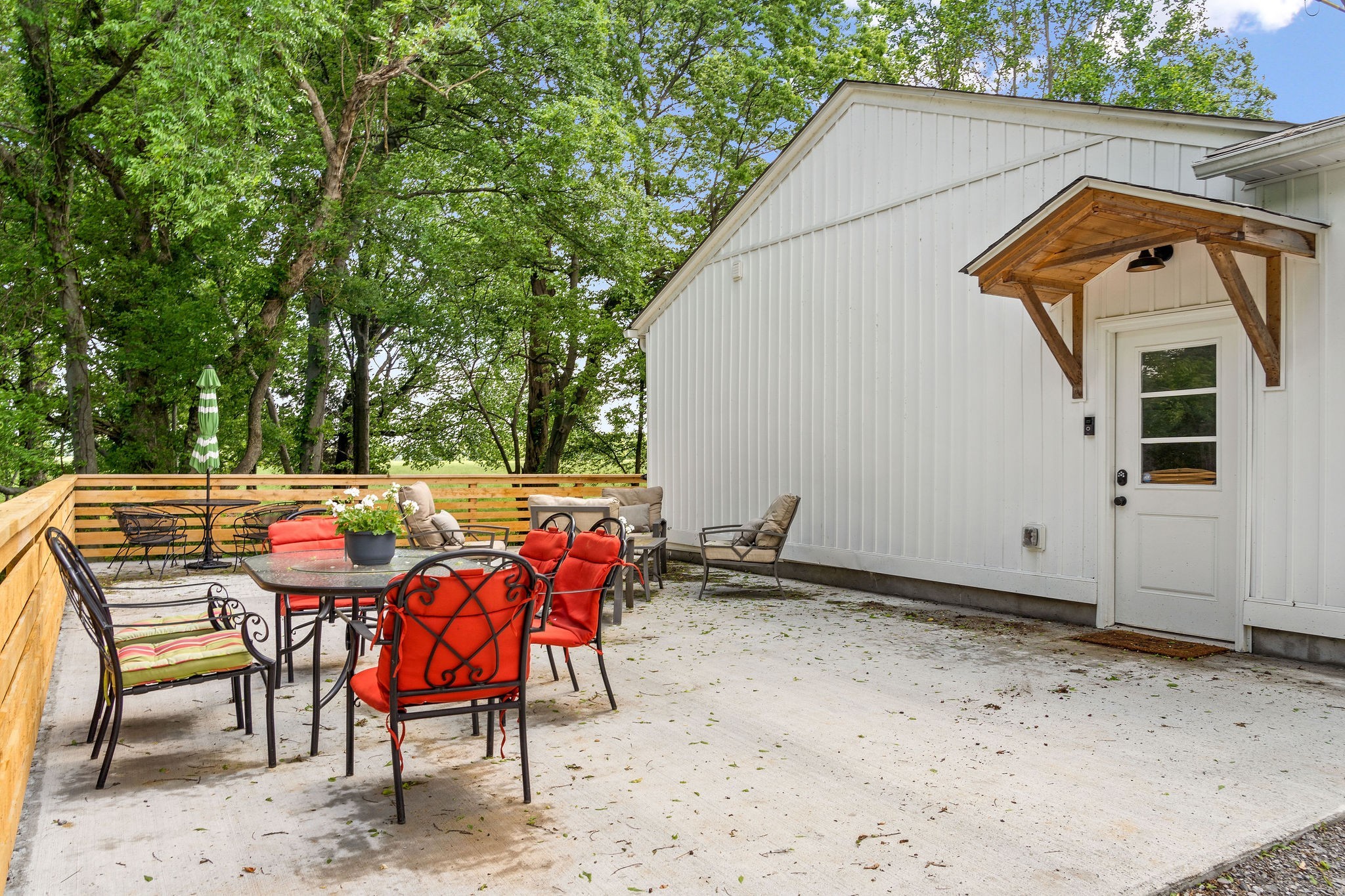 3612 Rossview Road Adams, TN 37010 - Photo 3 of 41 an outdoor space with furniture and umbrella