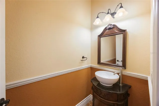 a bathroom with a toilet and a sink