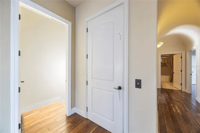 a view of bathroom with wooden floor
