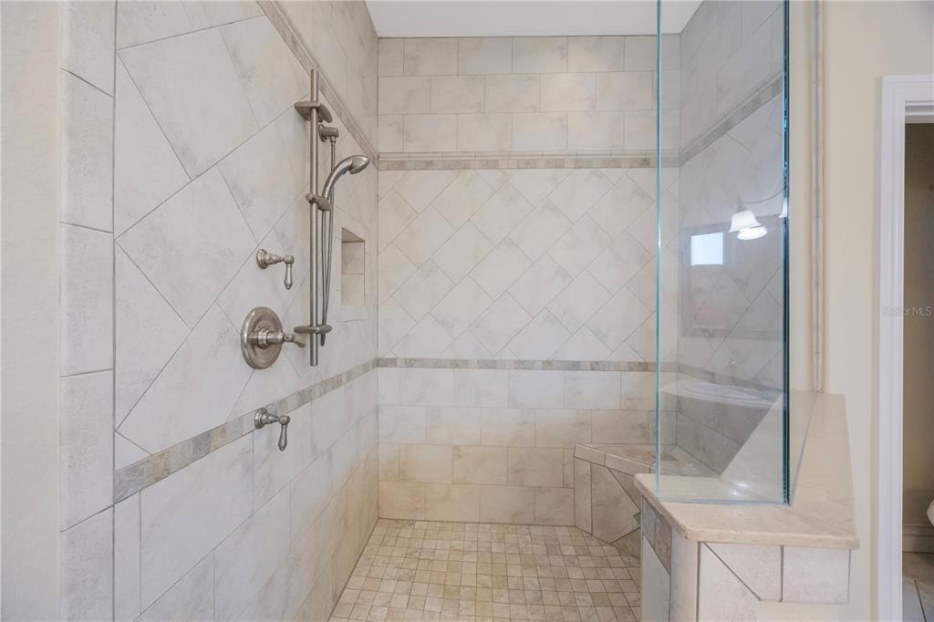 736 Pruitt Drive Madeira Beach, FL 33708 - Photo 28 of 42 a bathroom with a shower