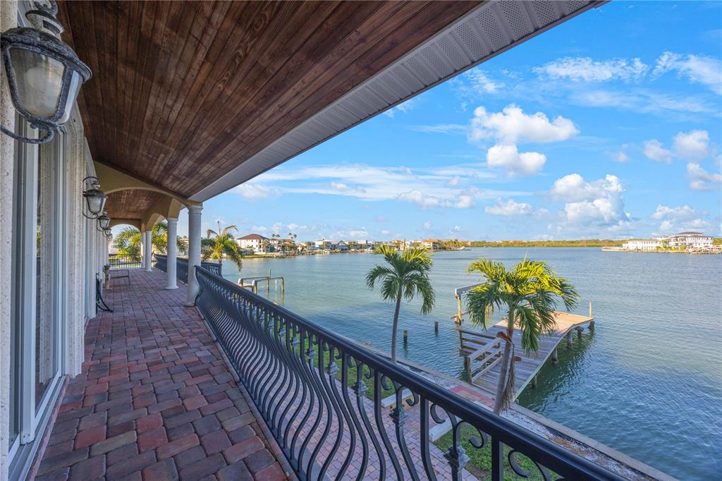 736 Pruitt Drive Madeira Beach, FL 33708 - Photo 29 of 42 a view of a balcony with wooden floor