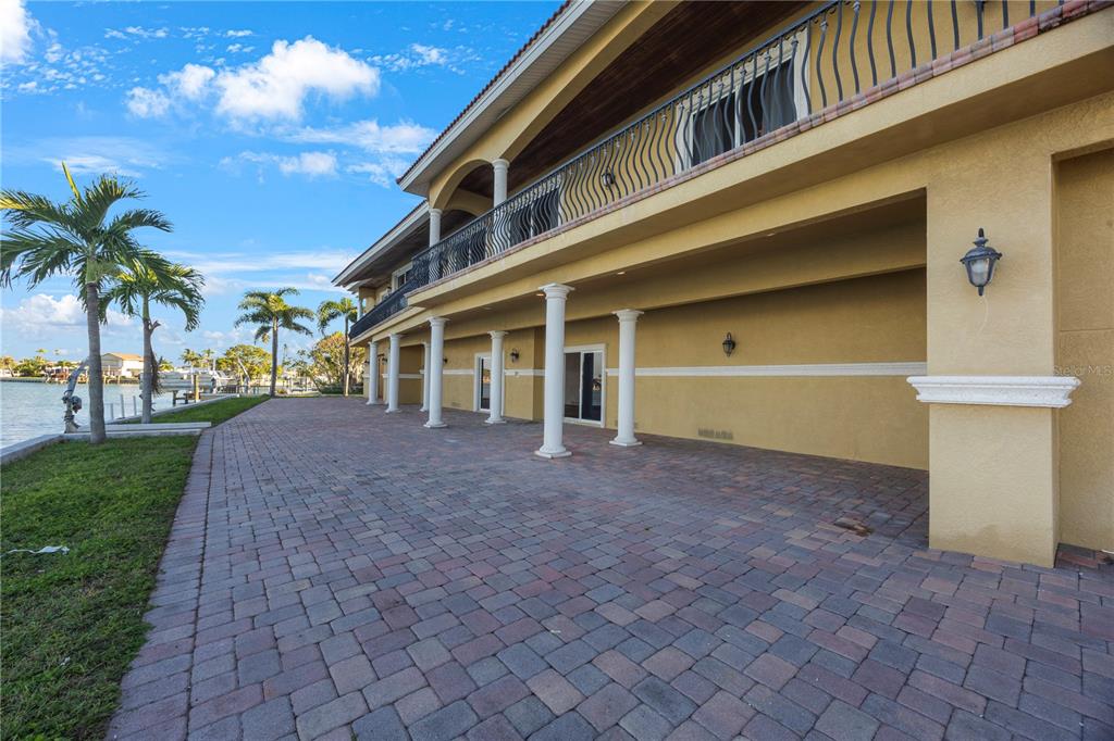 736 Pruitt Drive Madeira Beach, FL 33708 - Photo 33 of 42 a view of a house with a yard