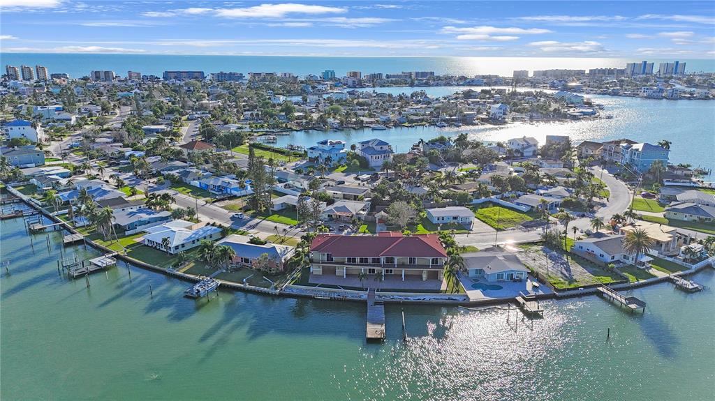 736 Pruitt Drive Madeira Beach, FL 33708 - Photo 40 of 42 a view of a city with lawn chairs