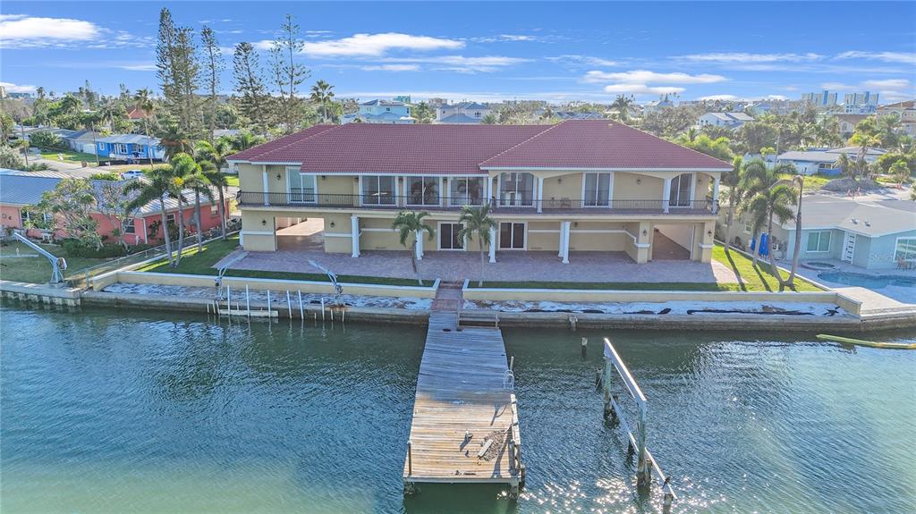 736 Pruitt Drive Madeira Beach, FL 33708 - Photo 41 of 42 swimming pool view with a lake view