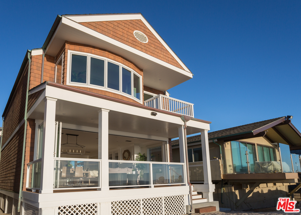 861 Mandalay Beach Road Oxnard, CA 93035 - Photo 1 of 31 a front view of a house