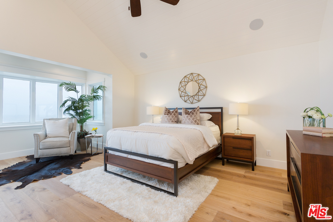 861 Mandalay Beach Road Oxnard, CA 93035 - Photo 15 of 31 a bedroom with a bed a couch and dresser