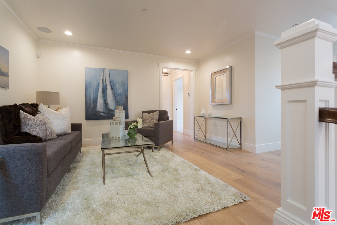 861 Mandalay Beach Road Oxnard, CA 93035 - Photo 21 of 31 a living room with furniture and a rug