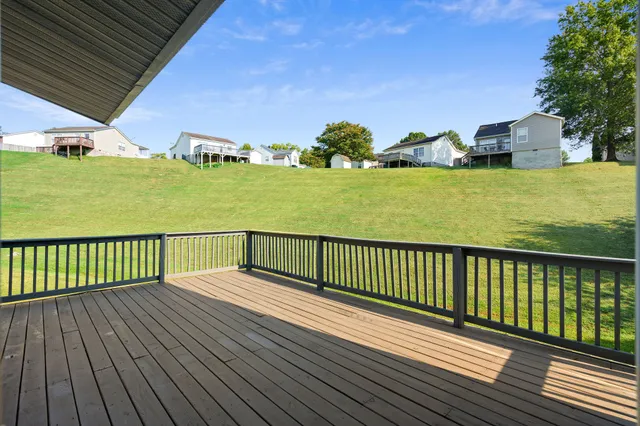 a view of a balcony with an ocean view