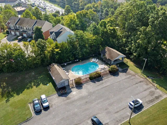 a view of a two chairs in the patio