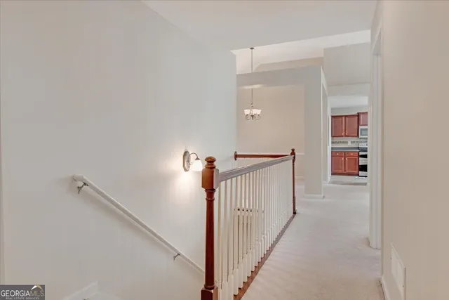 a view of a hallway with closet