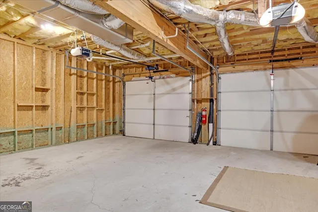 a view of a room with wooden walls