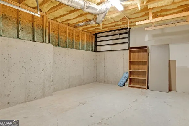a view of a room with wooden walls