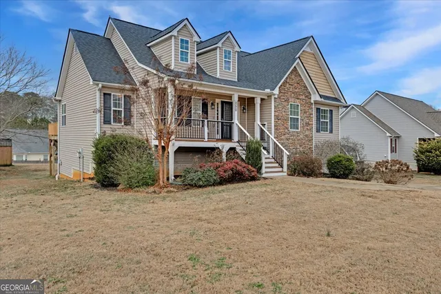 front view of a house with a yard