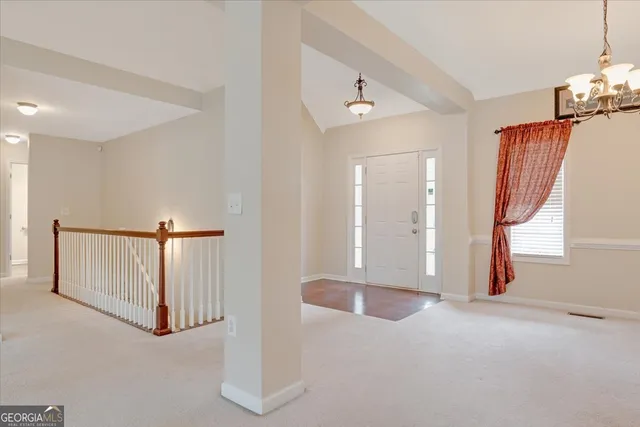 a view of a livingroom with a staircase