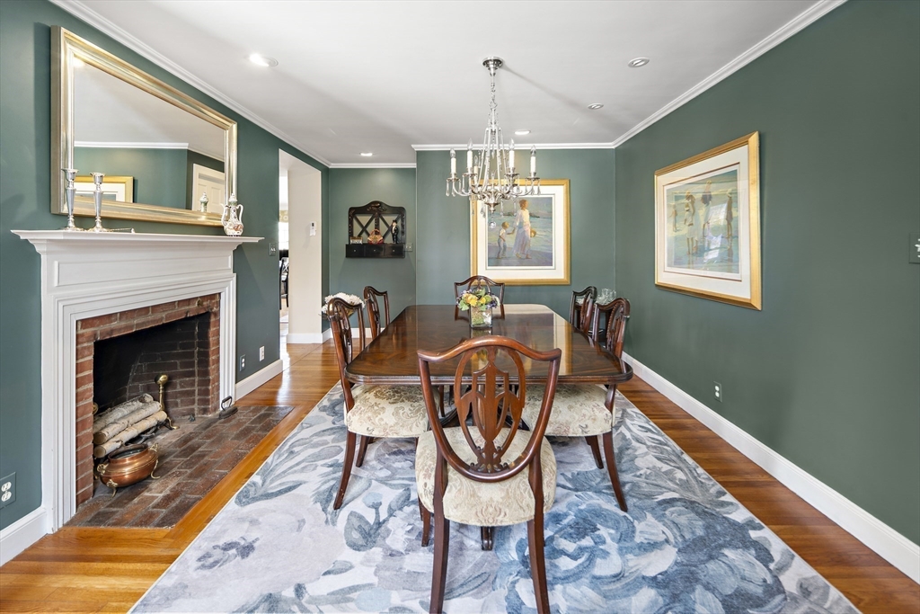 82 Risley Road Brookline, MA 02467 - Photo 11 of 20 a dining room with furniture a livingroom and wooden floor