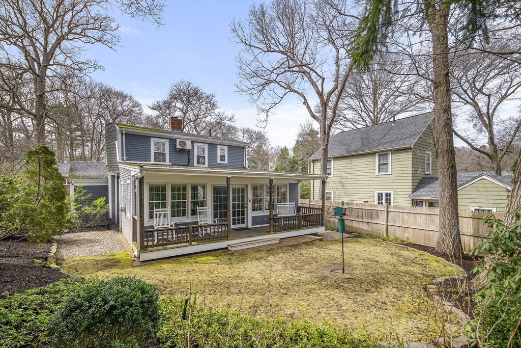 82 Risley Road Brookline, MA 02467 - Photo 19 of 20 front view of a house with a yard