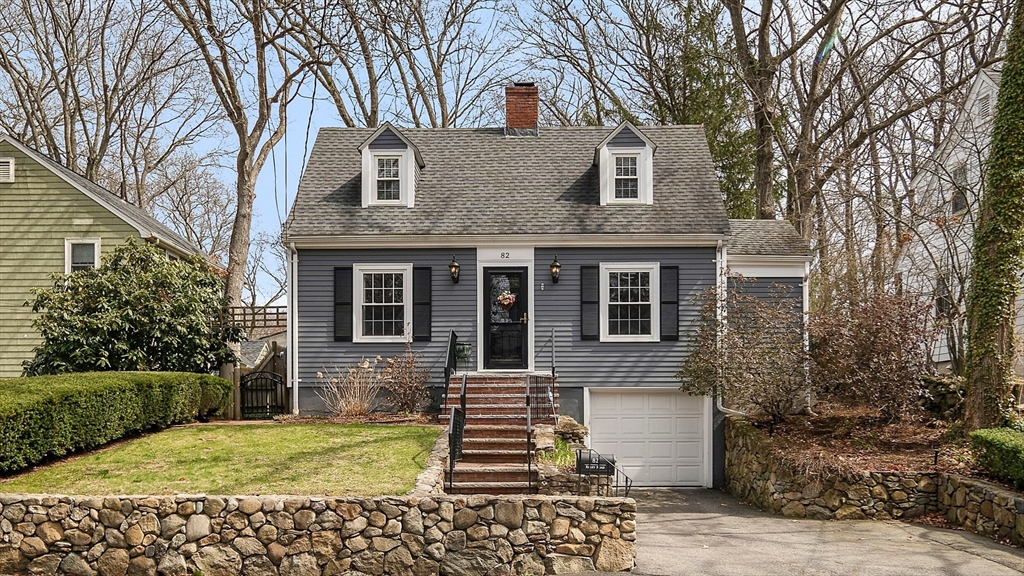 82 Risley Road Brookline, MA 02467 - Photo 2 of 20 a front view of a house with stairs