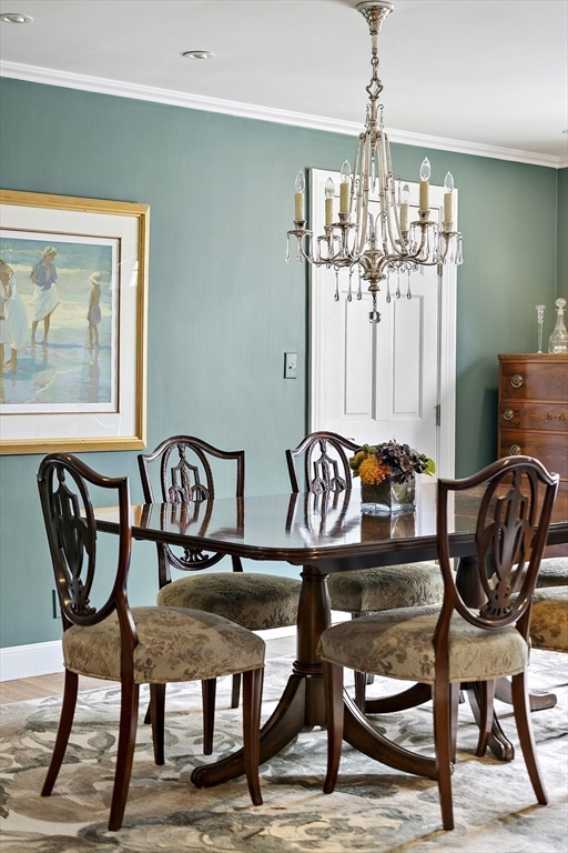 82 Risley Road Brookline, MA 02467 - Photo 10 of 20 a view of a dining room with furniture window and outside view