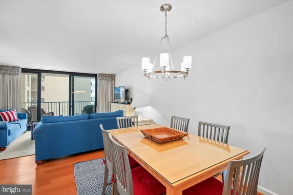 a kitchen with a table and chairs in it
