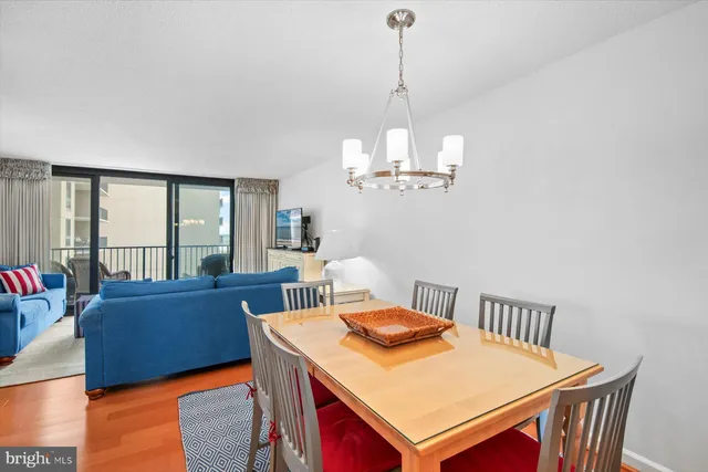 a kitchen with a table and chairs in it