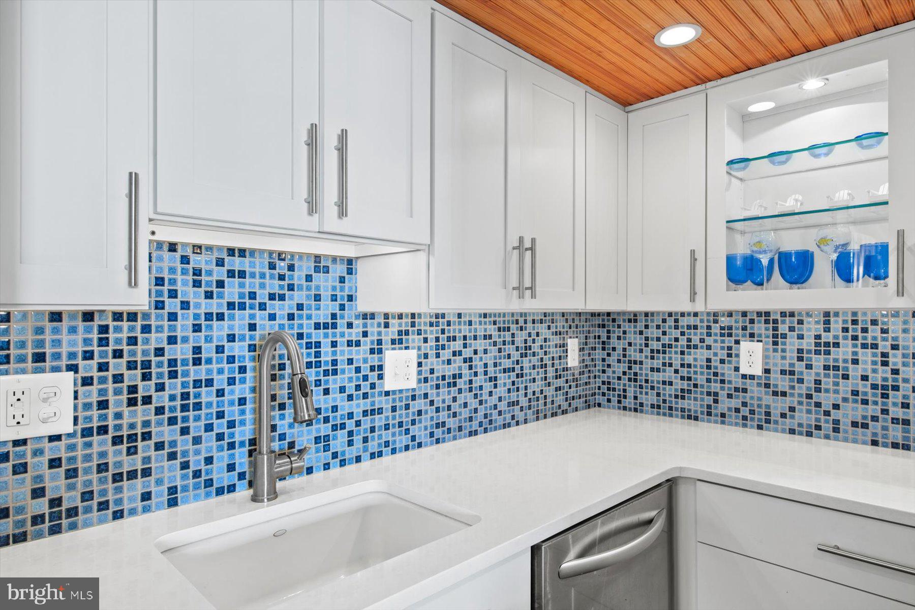 312 Island House Road Bethany Beach, DE 19930 - Photo 18 of 48 a bathroom with a sink a toilet and a shower