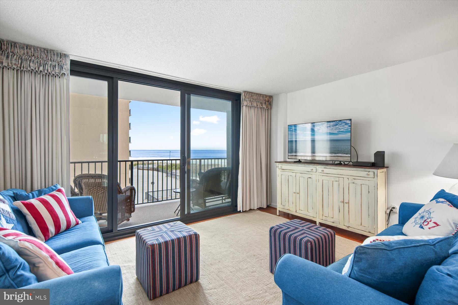 312 Island House Road Bethany Beach, DE 19930 - Photo 2 of 48 a living room with furniture and a window