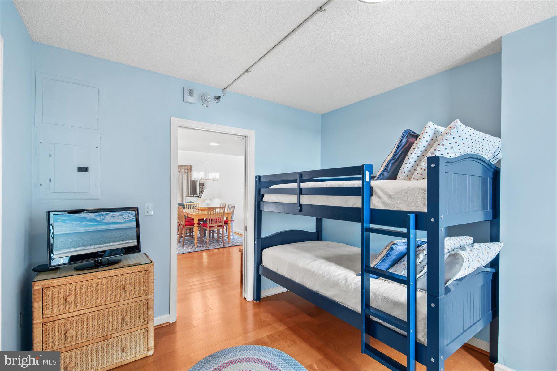 312 Island House Road Bethany Beach, DE 19930 - Photo 36 of 48 a bedroom with furniture and a dresser