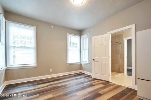 a view of an empty room and window