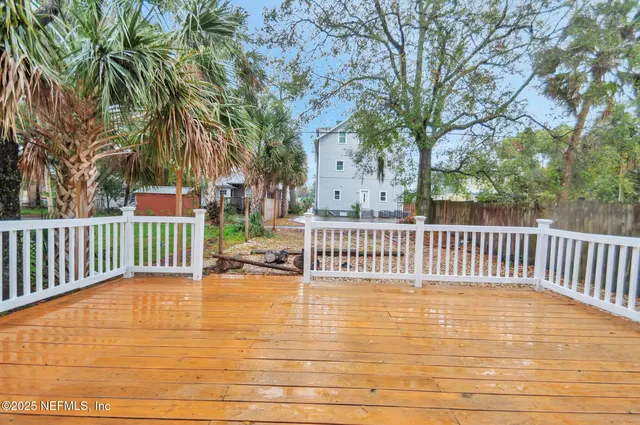 a view of deck with a large window