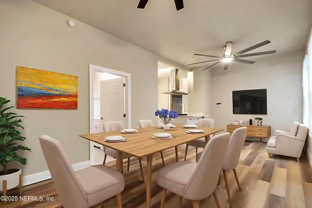 a view of a dining room with furniture