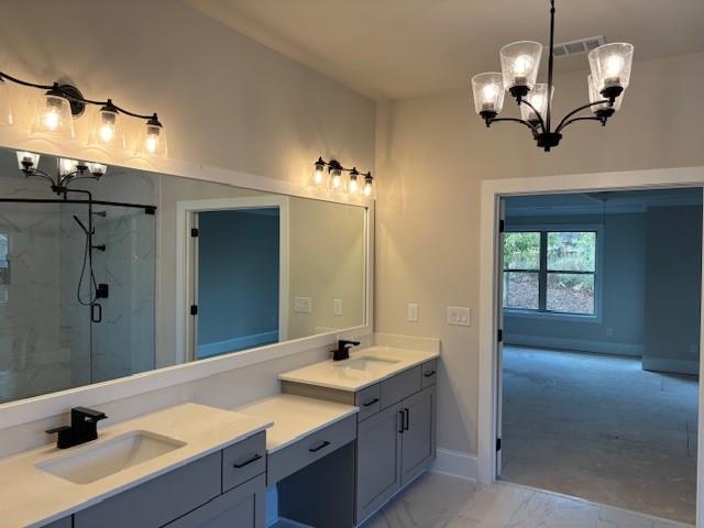 4015 Sierra Vista Circle Cumming, GA 30040 - Photo 19 of 29 a bathroom with a double vanity sink and a mirror