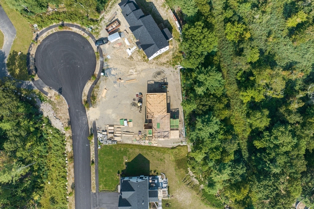 25 Holly Way Canton, MA 02021 - Photo 11 of 25 an aerial view of a house with a garden