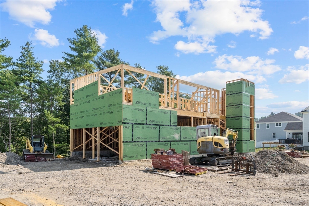 25 Holly Way Canton, MA 02021 - Photo 7 of 25 a front view of a house with outdoor space
